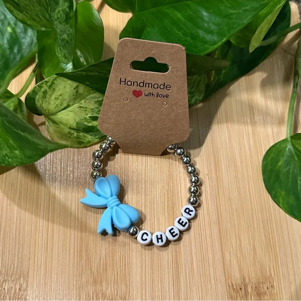 Silver Kids’ Stretchy Beaded Cheer Bracelet | Handmade | Silicone Bow 📣✨ - Picture 1 of 1